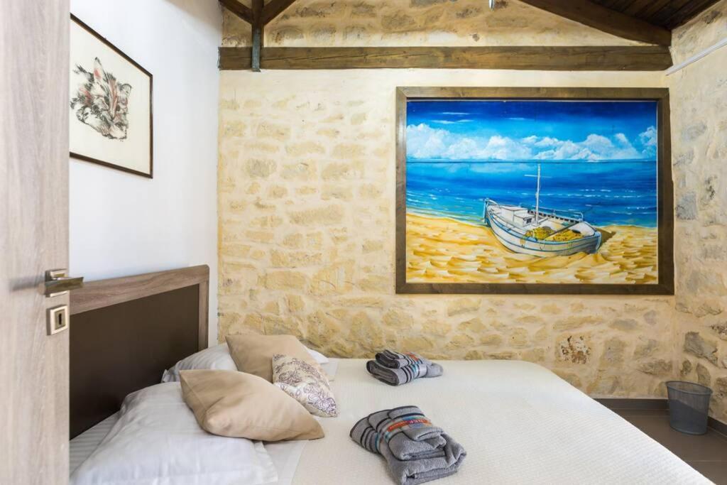 Villa Proto Helidoni - A Cozy Beachfront Villa Petres  Екстер'єр фото